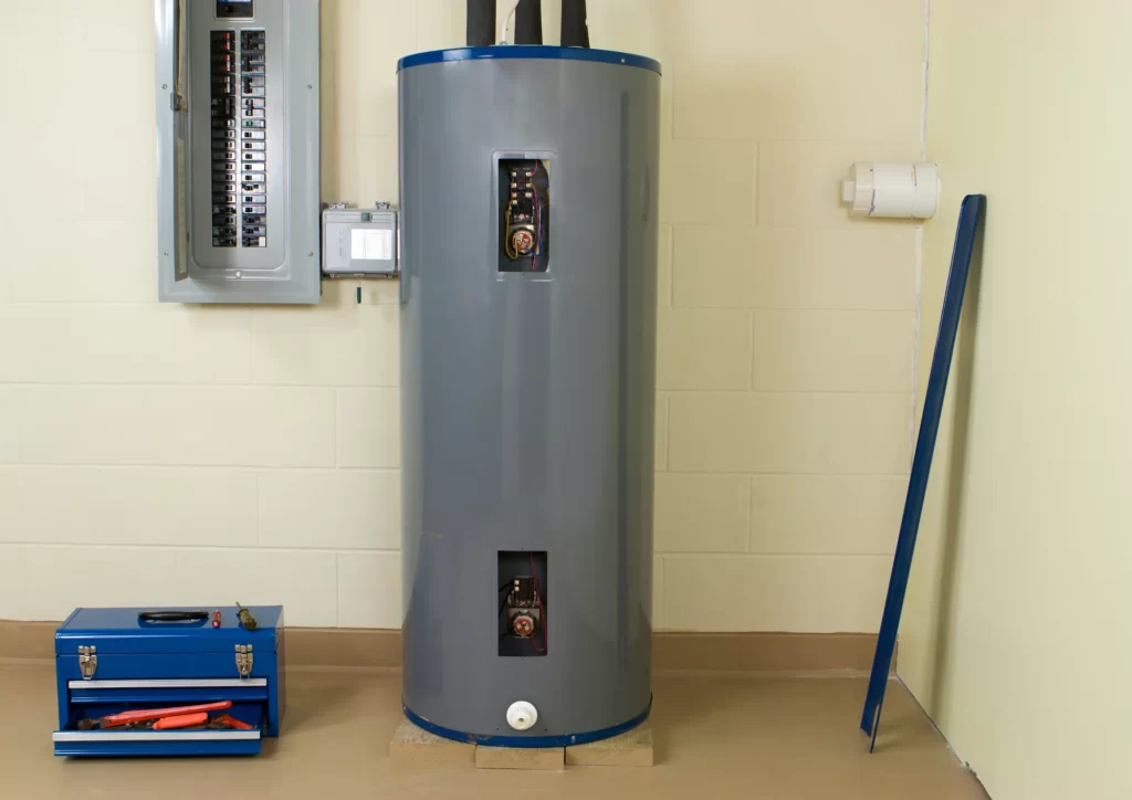 Water heater installed inside a building, showing a typical lifespan scenario by NWA C&S Plumbing