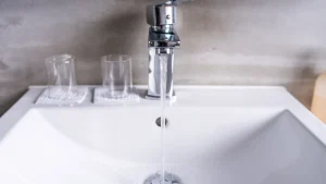 Low water flow from bathroom faucet into sink