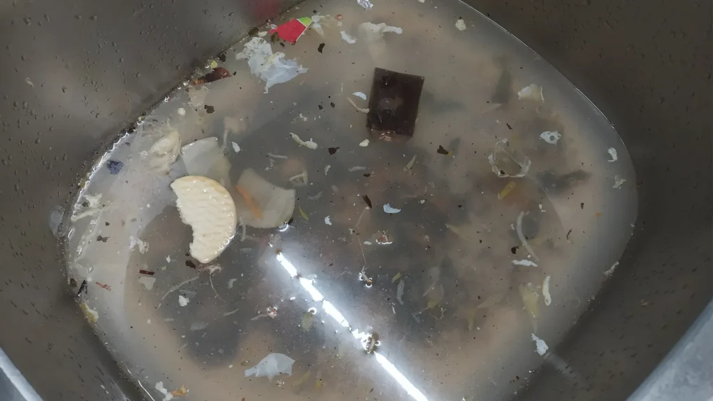 itchen sink drain clog grease wipes food buildup pipe blockage plumbing